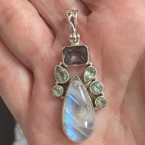 Gorgeous rainbow moonstone garnet and quartz sterling pendant
